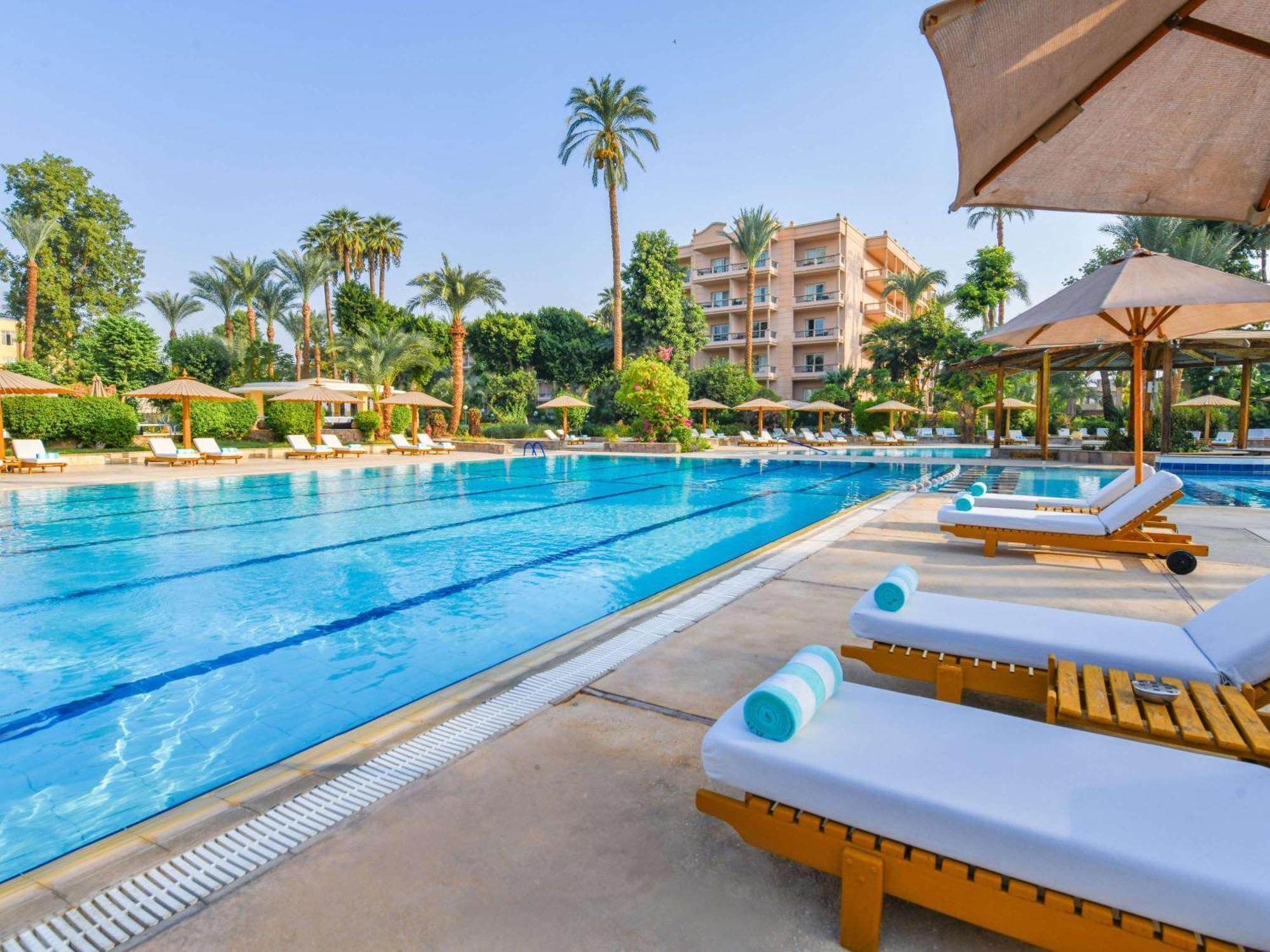 Pavillon Winter Luxor Hotel Exterior photo The pool at the Four Seasons Hotel, Cairo